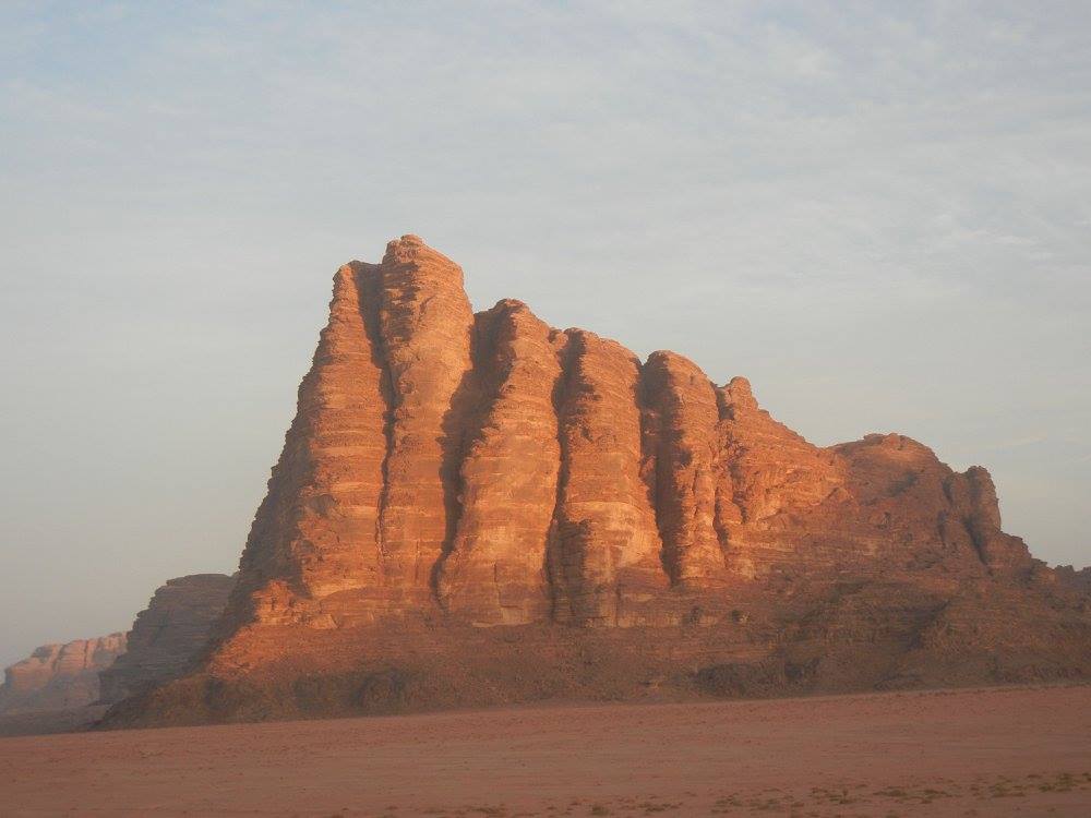 The Seven Pillars of Wisdom rock formation in the Wadi Rum desert in Jordan