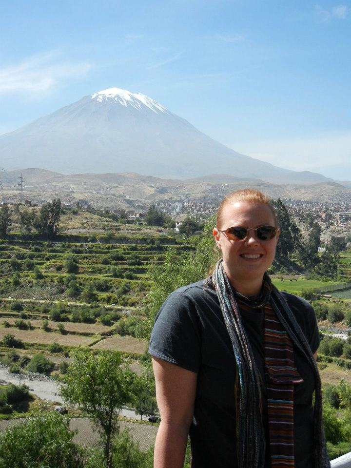 Samantha Hansen standing in front of Misti Volcano in Arequipa, Peru